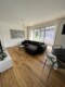 Neuwertige 2,5 Zimmer-Wohnung mit schöner Dachterrasse in Vorberg - Wohnbereich