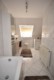 Moderne DG-Wohnung mit hochwertiger Ausstattung in Weingarten - Badezimmer