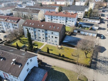 Invest­ment mit Poten­tial: 15-Fami­li­en­haus mit mög­li­chem Bau­grund­stück in Ravensburg-West, 88213 Ravensburg, Mehrfamilienhaus